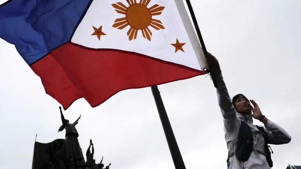 A 9-story building in the Philippines collapses, trapping dozens of workers