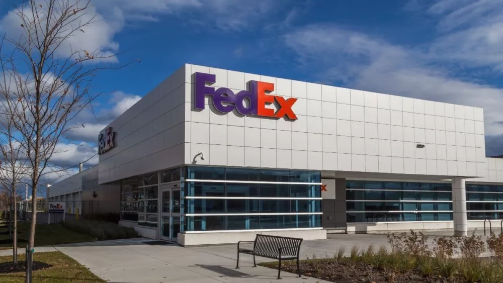 FedEx logo on the building of FedEx Ship Centre in Toronto. TORONTO^ CANADA - NOVEMBER 19^ 2017