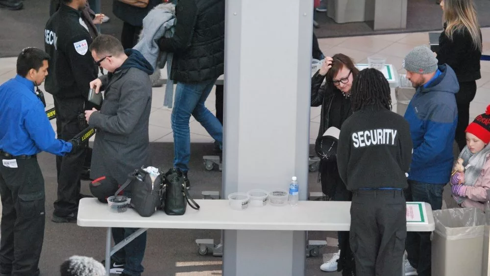 Security Checkpoint and control in Toronto^ Canada - March 24 2018: Scanning Machines^ People's Bags Getting Checked.