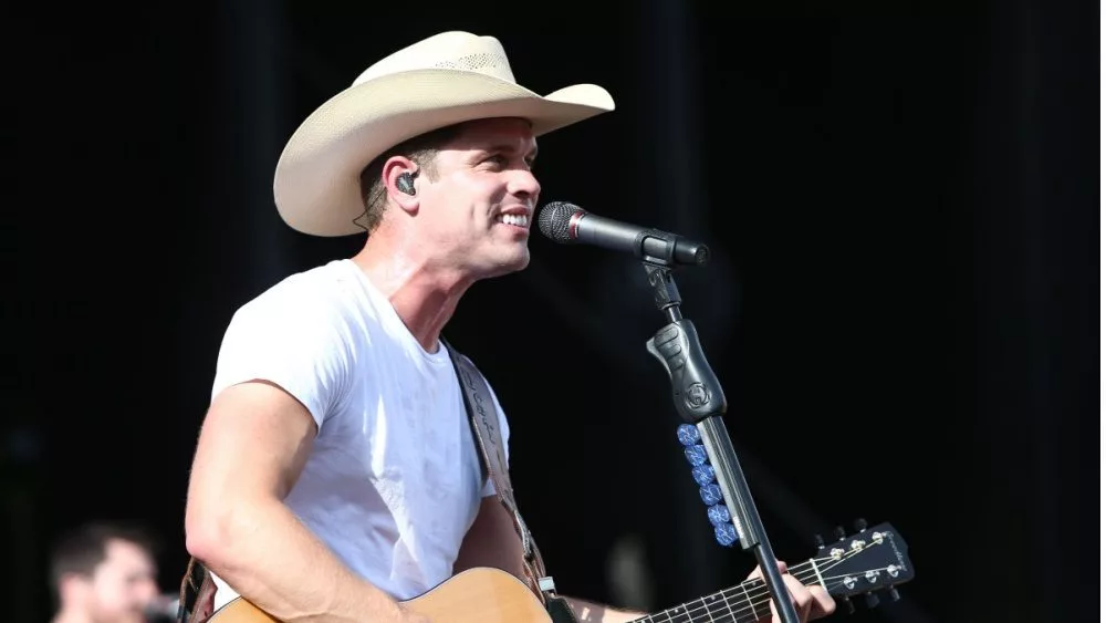 Dustin Lynch performs during the 'Kick The Dust Up' Tour at Vanderbilt Stadium on July 11^ 2015 in Nashville^ Tennessee.