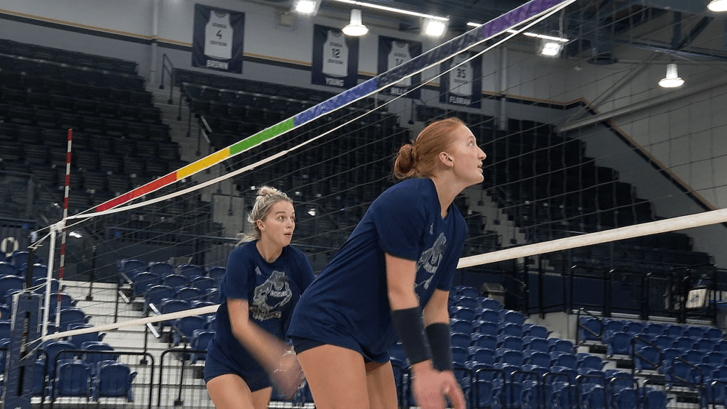 georgia-southern-middle-blocker-claire-smith-and-attacker-jillian-gray-prepare-for-a-tandem-block-in-practice-66e0aa11f0eba49565