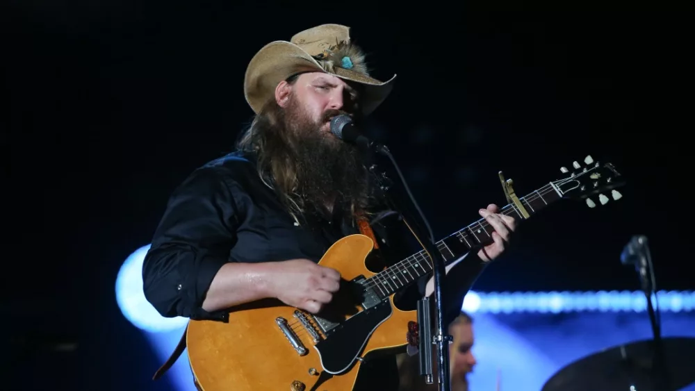 Chris Stapleton performs at the 2018 CMA Fest at Nissan Stadium on June 9^ 2018 in Nashville^ Tennessee.