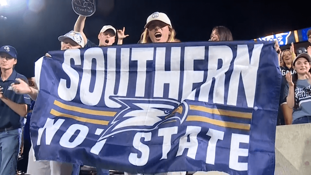 georgia-southern-fan-holds-flag-at-game-against-georgia-state-66f1d71264f26781285