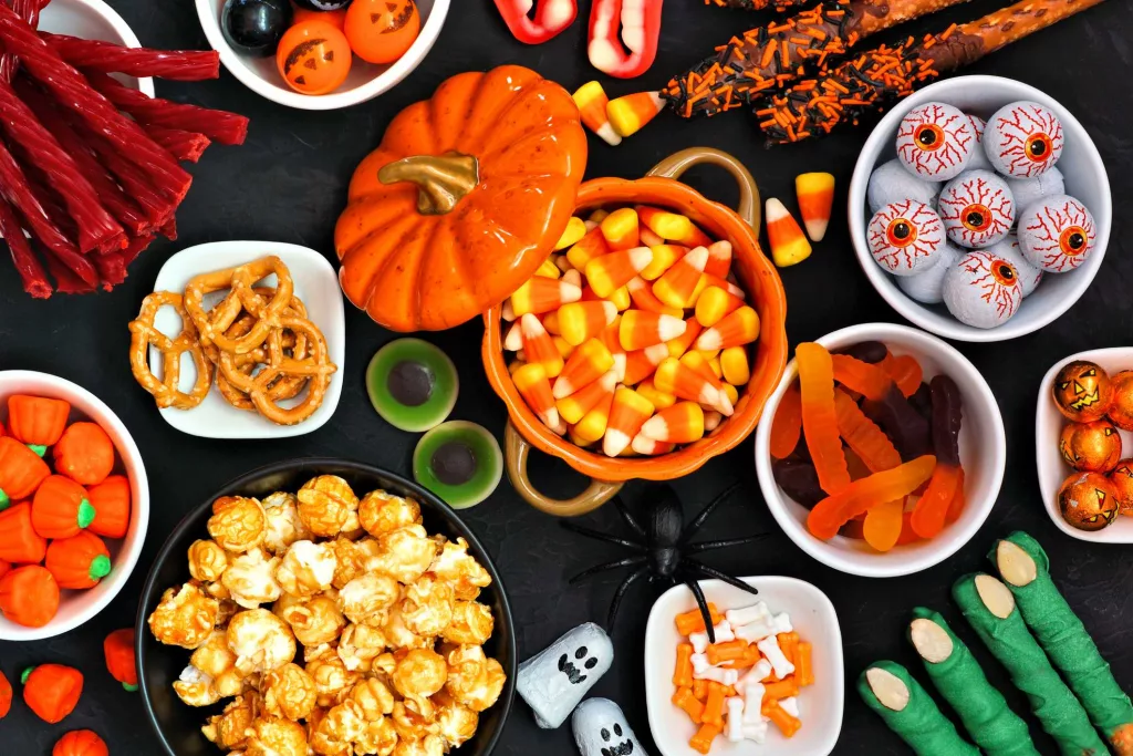 halloween-candy-buffet-table-top-view-over-a-black-royalty-free-image-1728070167898964