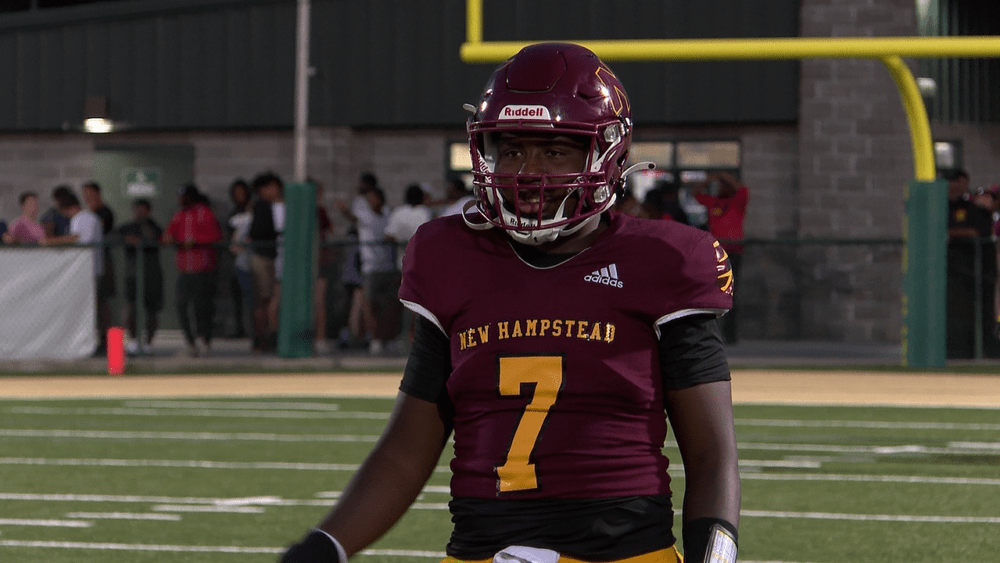 new-hampstead-quarterback-rashawn-truell-warms-up-ahead-of-the-second-half-against-effingham-south-66bebebd5ec6c662720