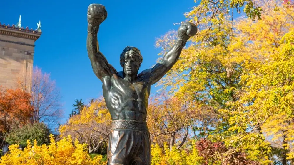 PHILADELPHIA^ PENNSYLVANIA - NOVEMBR 16^ 2016: The Rocky Balboa statue during autumn. The statue commemorates the The Rocky film series which has become a cultural icon.