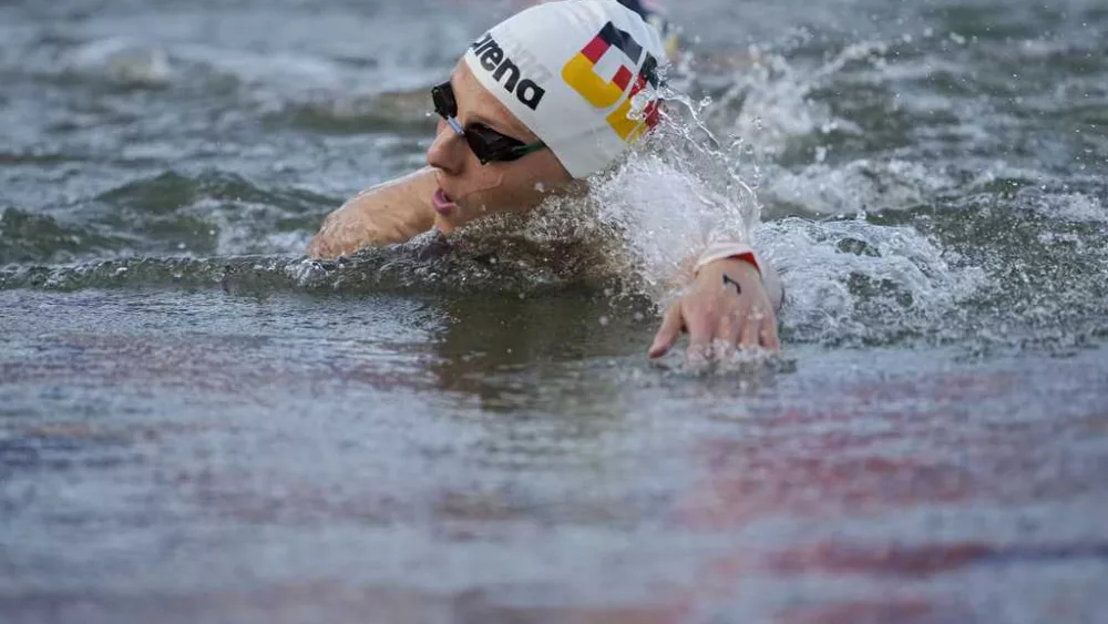 Three German open water swimmers fall ill after Olympic races in the Seine River