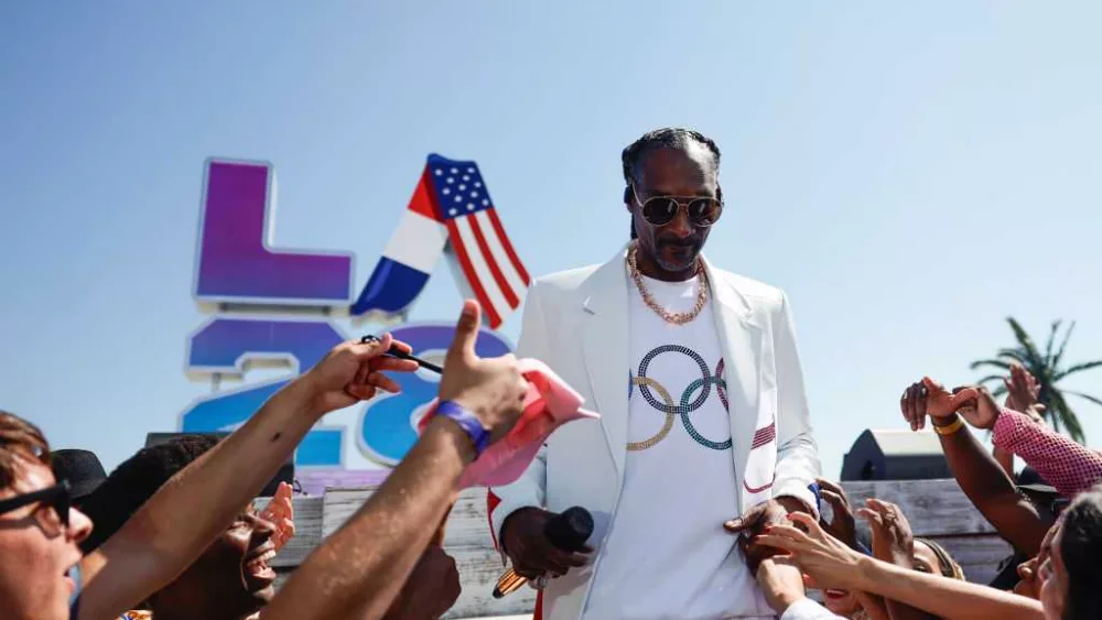 Snoop's side quests: Beyond the Olympics, rapper has proved versatility from cooking to wrestling