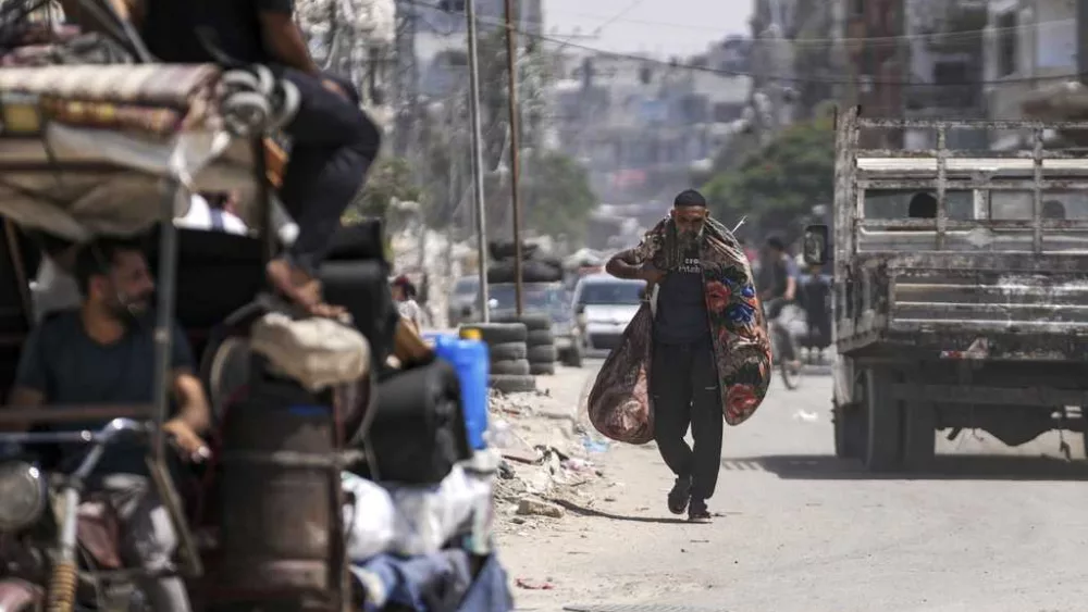 An Israeli airstrike kills 18 members of a family in Gaza as mediators hope for a cease-fire