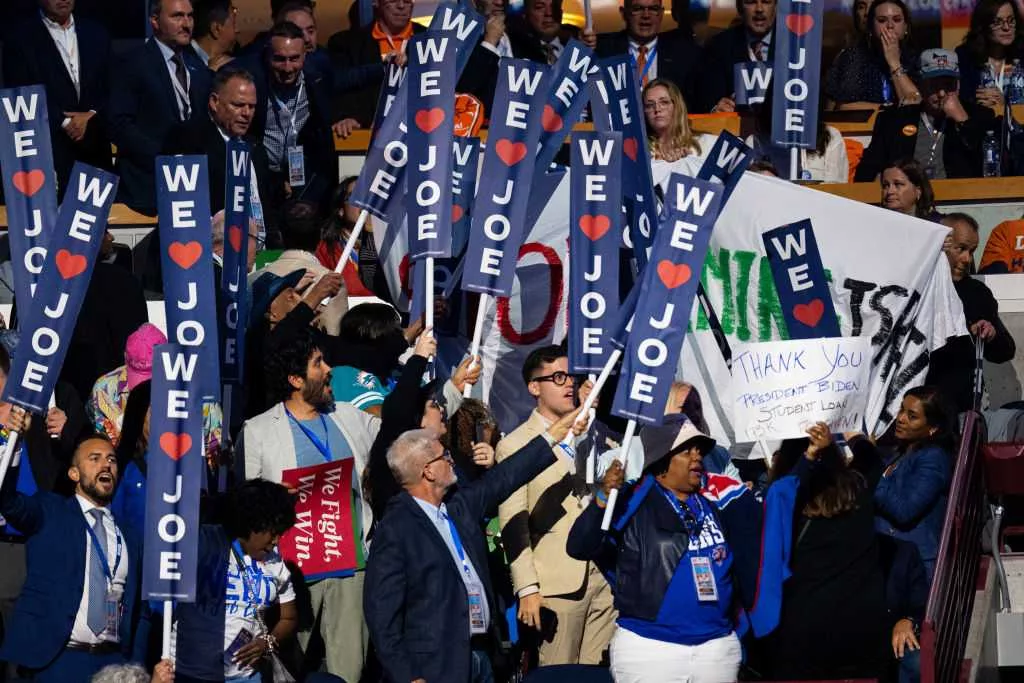 Abandon Biden protesters unveil banner during his DNC speech