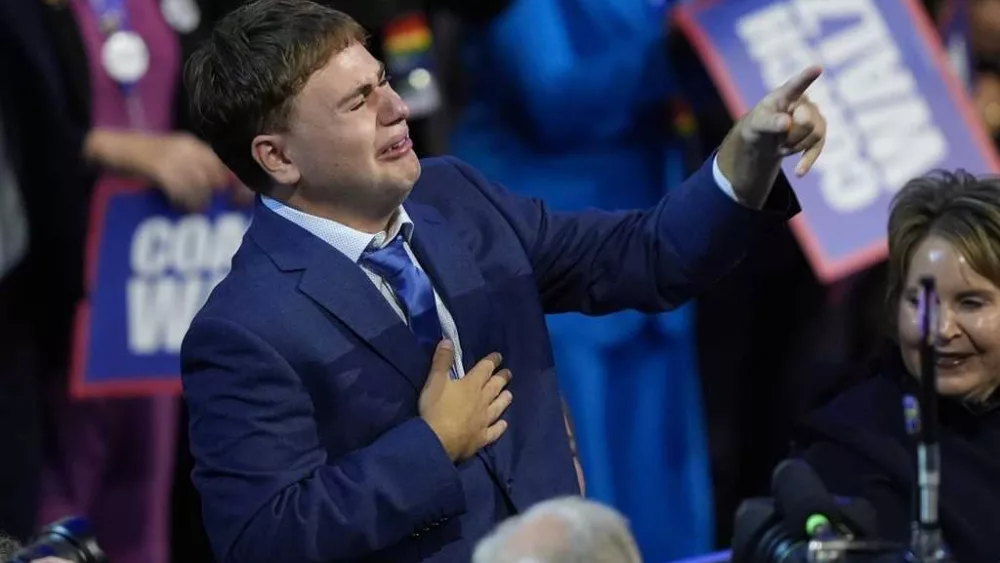 'That’s my dad!': Gus Walz tearfully cheers on his father as he accepts Democratic VP nomination