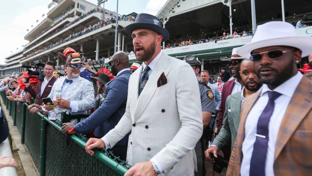 Travis Kelce 'racing' into a different sport, all while making a nod to girlfriend Taylor Swift