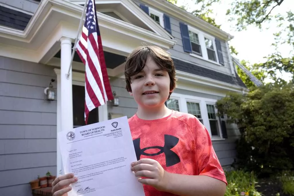 Residents in Boston suburb raised $20K after town officials shut down boy's ice cream stand
