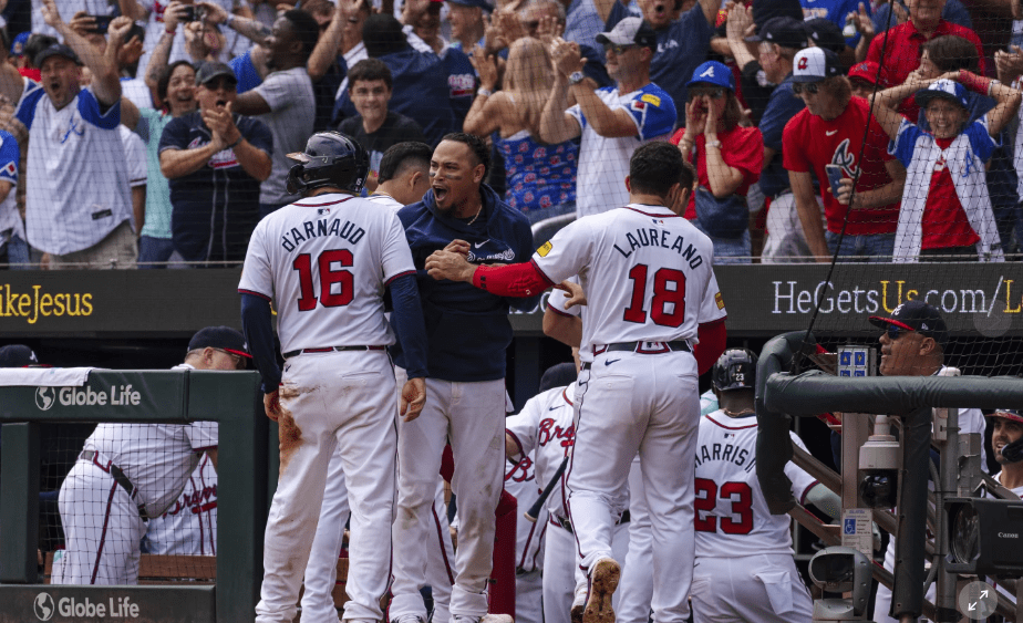 Atlanta splits doubleheader with New York to secure playoff spot