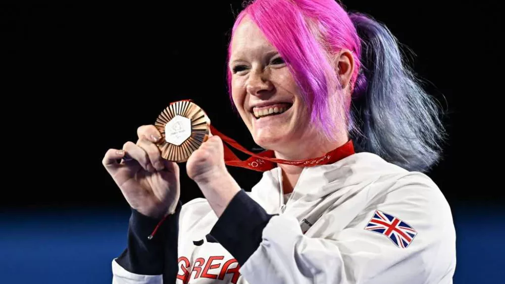 Jodie Grinham becomes first athlete to win Paralympic medal while pregnant