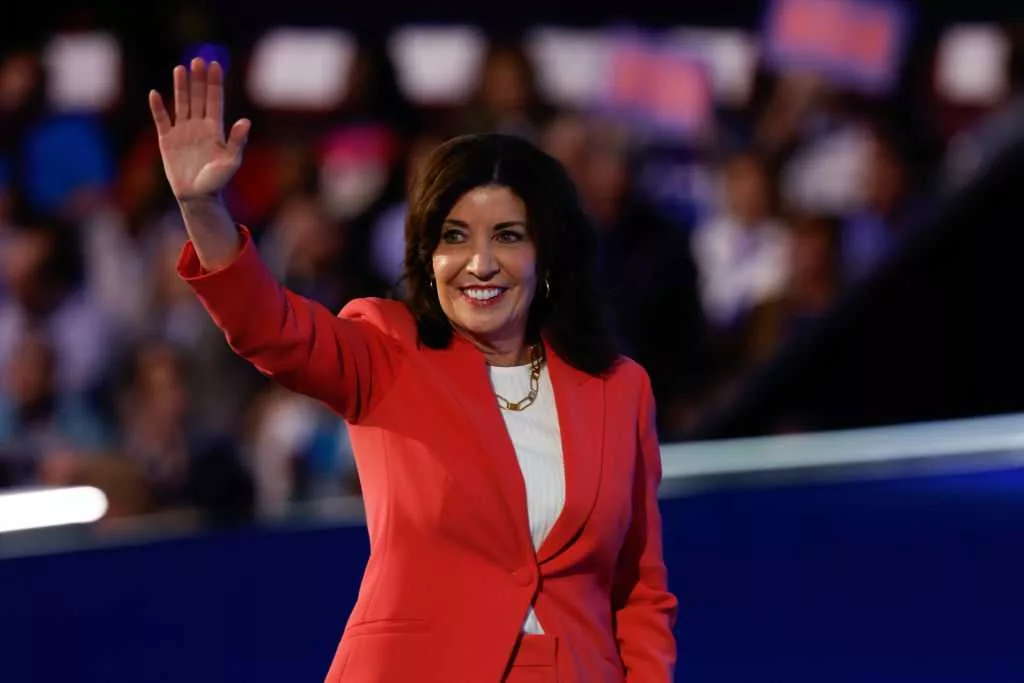 Former aide to New York's governor is charged with being an agent of the Chinese government