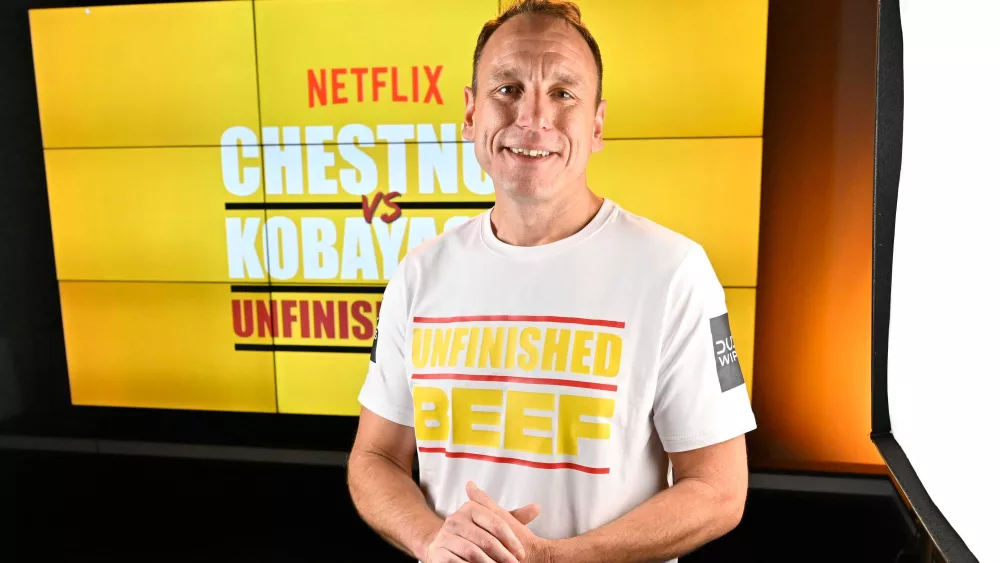 Joey Chestnut breaks own world record, beating rival Takeru Kobayashi
