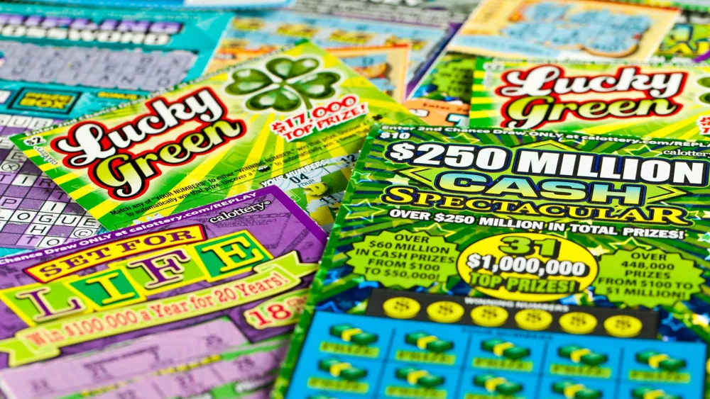 Woman wins $1 million lottery prize, hides it under her mattress