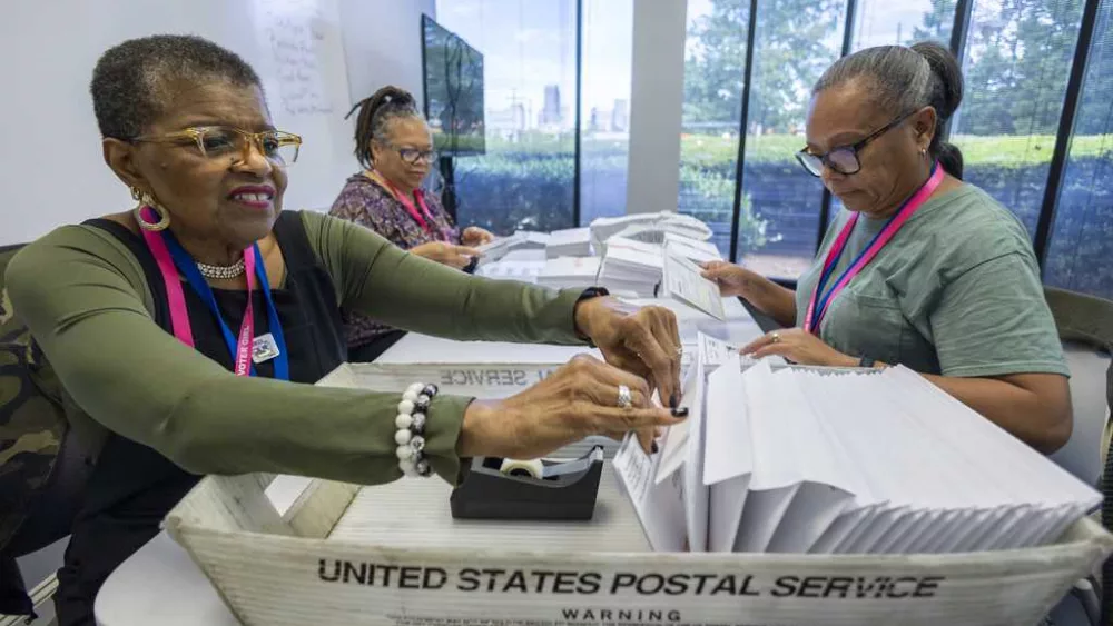 Election officials warn that widespread problems with the US mail system could disrupt voting