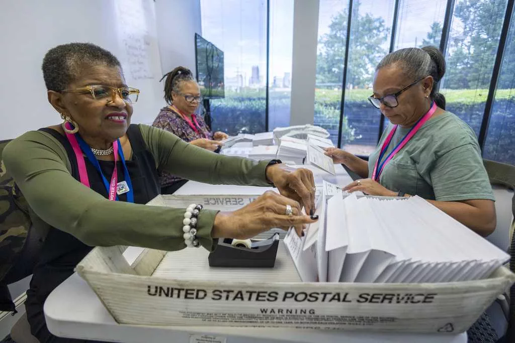 Election officials warn that widespread problems with the US mail system could disrupt voting