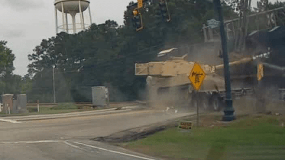 Caught on Video: Train smashes into tractor-trailer carrying military vehicle in South Carolina