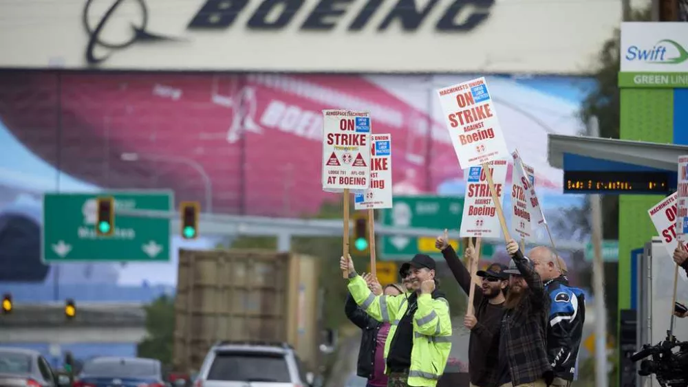 Workers who assemble Boeing planes are on strike. Will that affect flights?