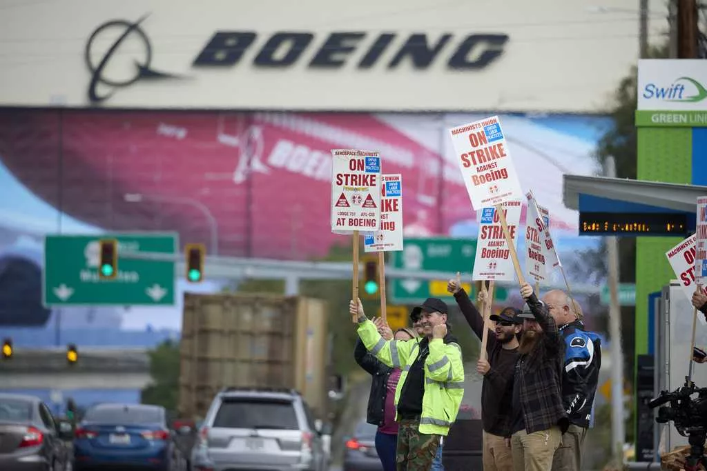 Workers who assemble Boeing planes are on strike. Will that affect flights?