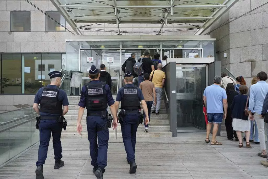 A French man admits in court to drugging his wife so that he and dozens of men could rape her