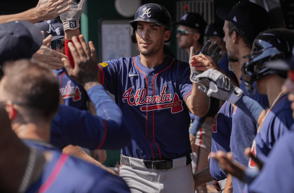 Olson homers twice and Sale wins his major league-leading 18th as the Braves rout the Reds 15-3