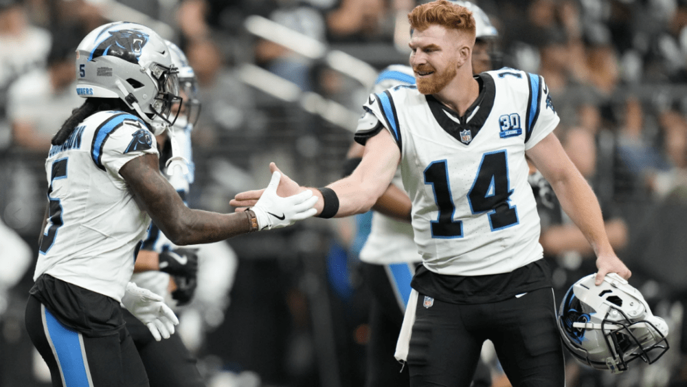 Andy Dalton passes for 319 yards and 3 TDs to lead Panthers past Raiders 36-22 for first win