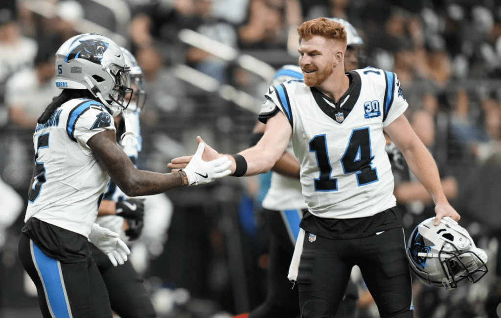 Andy Dalton passes for 319 yards and 3 TDs to lead Panthers past Raiders 36-22 for first win