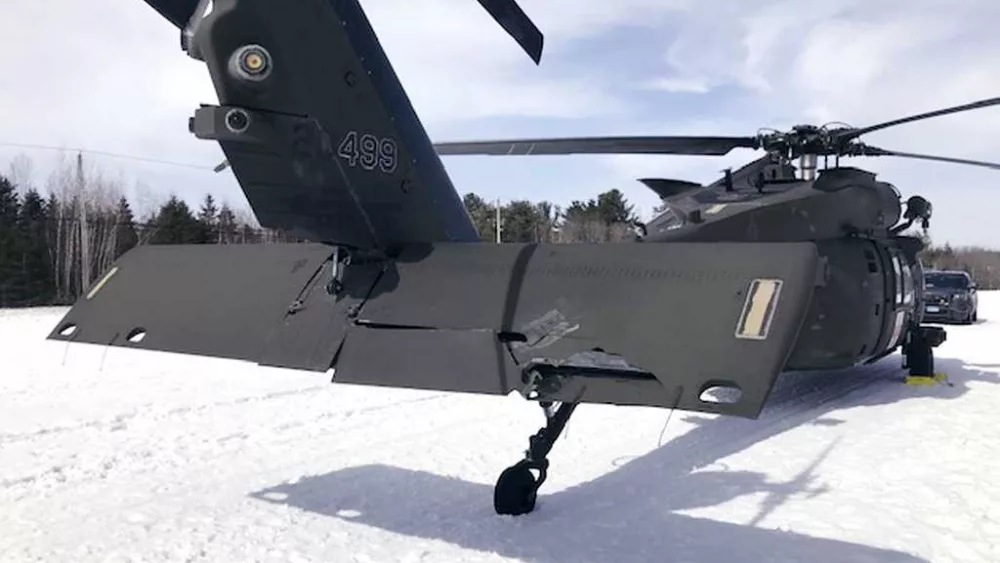 Snowmobiler who crashed into parked Black Hawk helicopter awarded $3 million