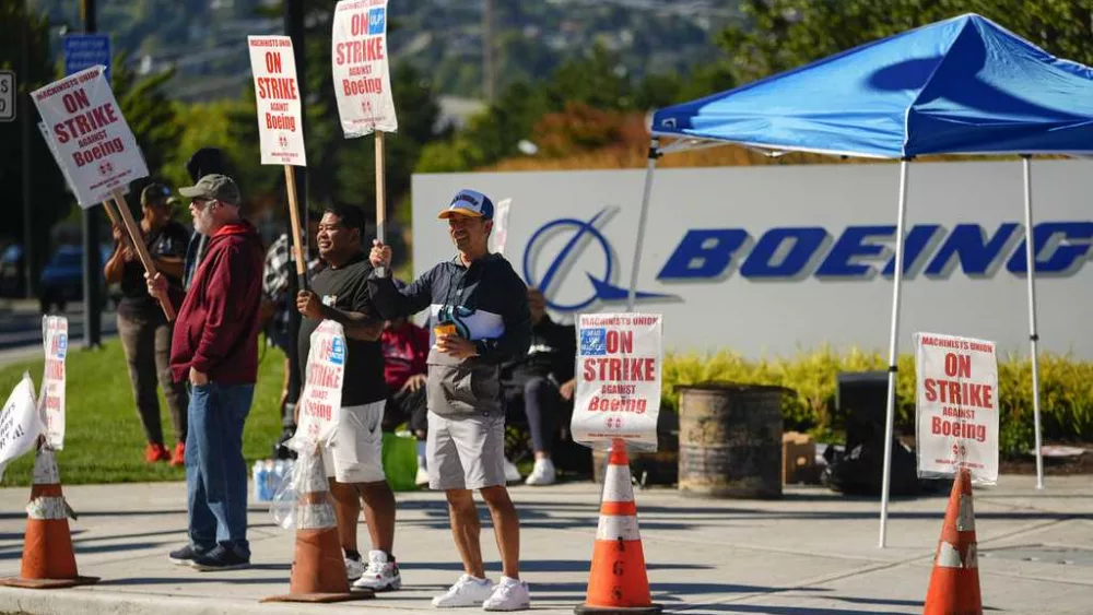 Boeing and union negotiators set to meet for contract talks 2 weeks into worker strike