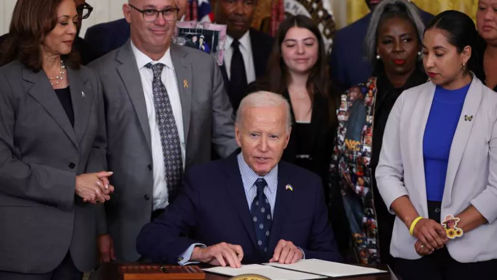 Harris says the right to be safe is a civil right, as Biden signs order on gun technology