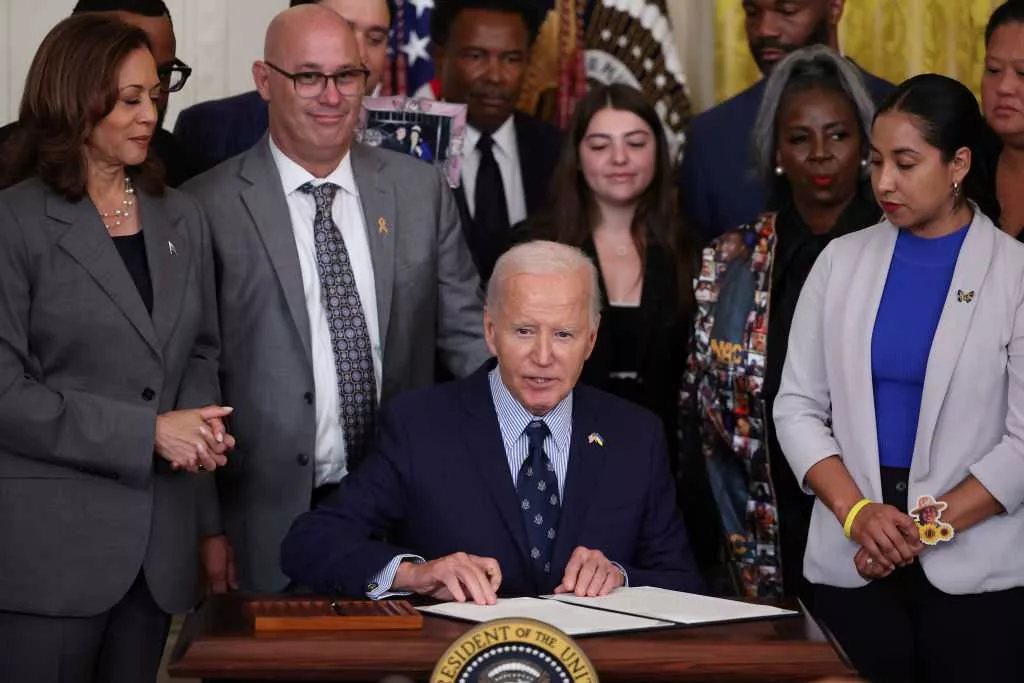 Harris says the right to be safe is a civil right, as Biden signs order on gun technology