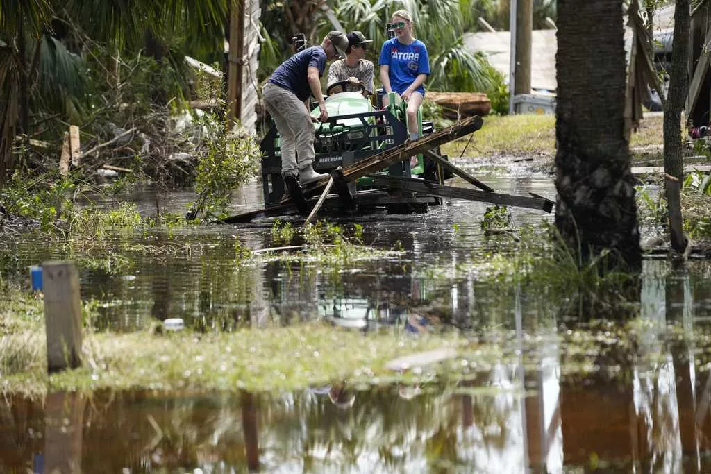 Biden, Harris pledge federal aid after touring devastation from Helene