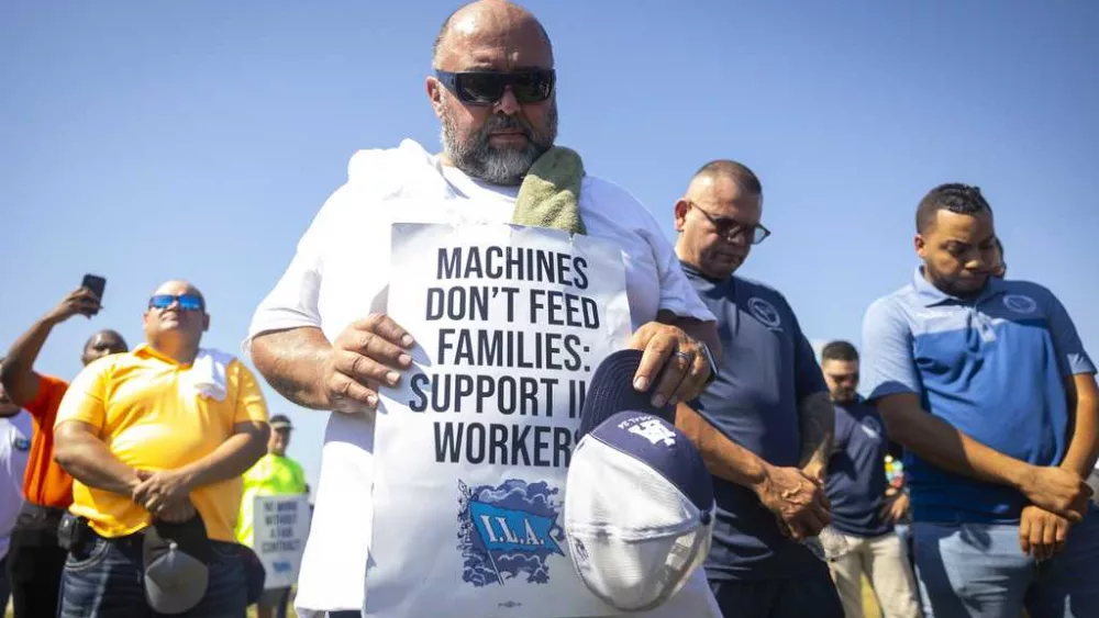 Biden administration holds back on intervention in dockworkers strike