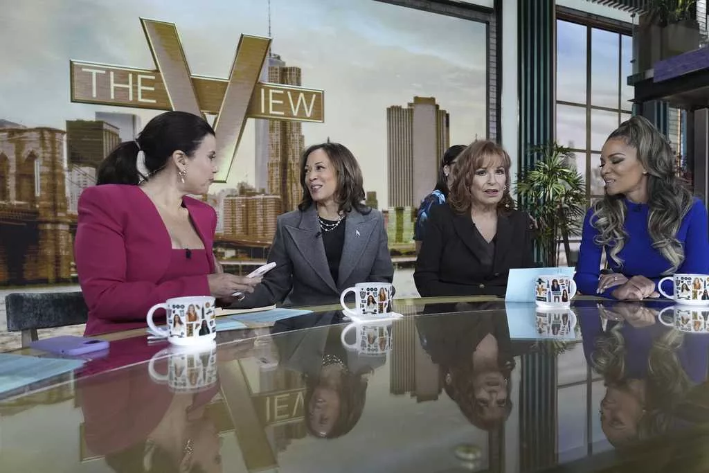 Harris gets personal in media blitz, balks at breaking with Biden on policy