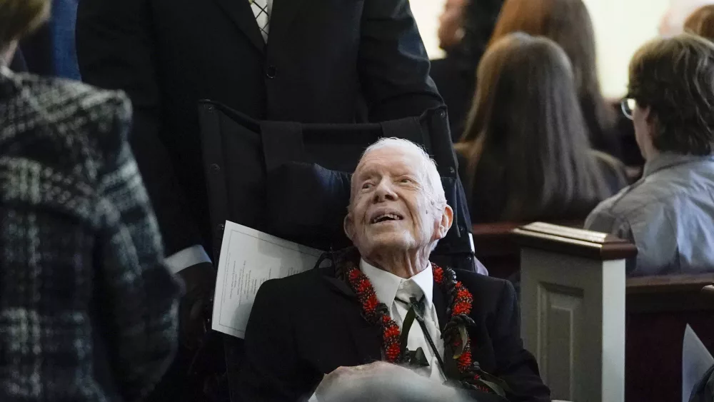 Former President Jimmy Carter votes by mail