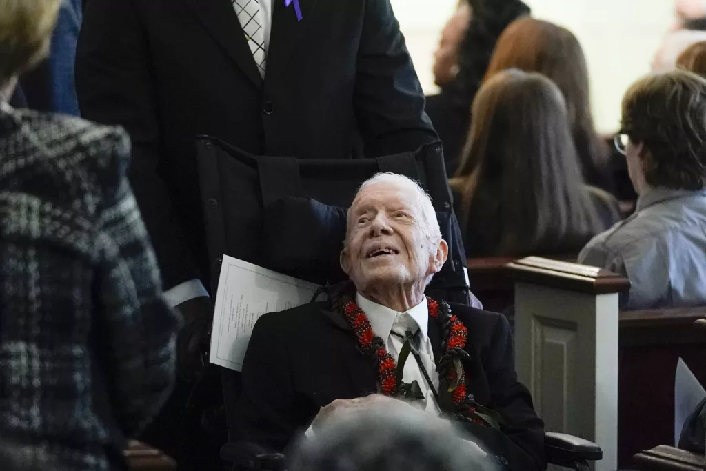 Former President Jimmy Carter votes by mail