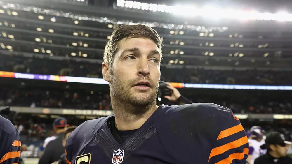 Ex-NFL quarterback Jay Cutler charged with DUI, possession of handgun