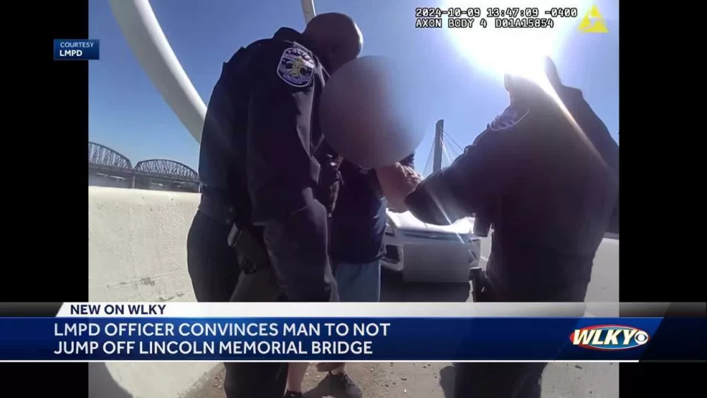 Louisville police officer credited with stopping man from jumping off bridge