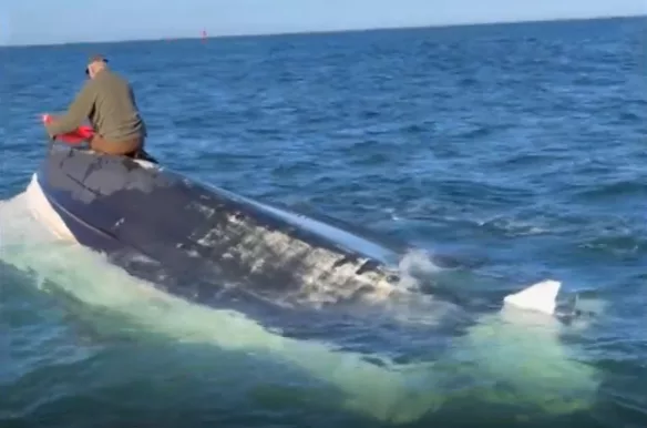 Two fishermen rescue man on overturned boat off the coast of Cape Cod