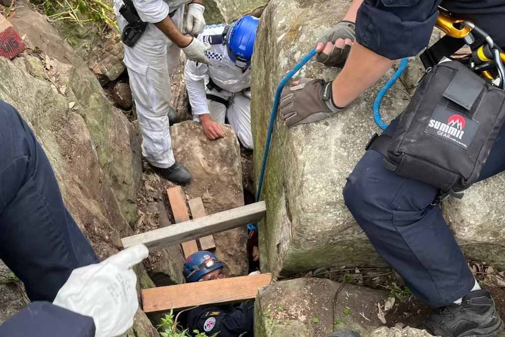 Woman wedged upside down between rocks for 7 hours after trying to retrieve her phone