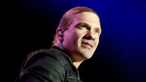 Brent Smith of Shinedown against a black and blue background at Rockstar Uproar Festival on September 25 2012 in Nampa^ Idaho.