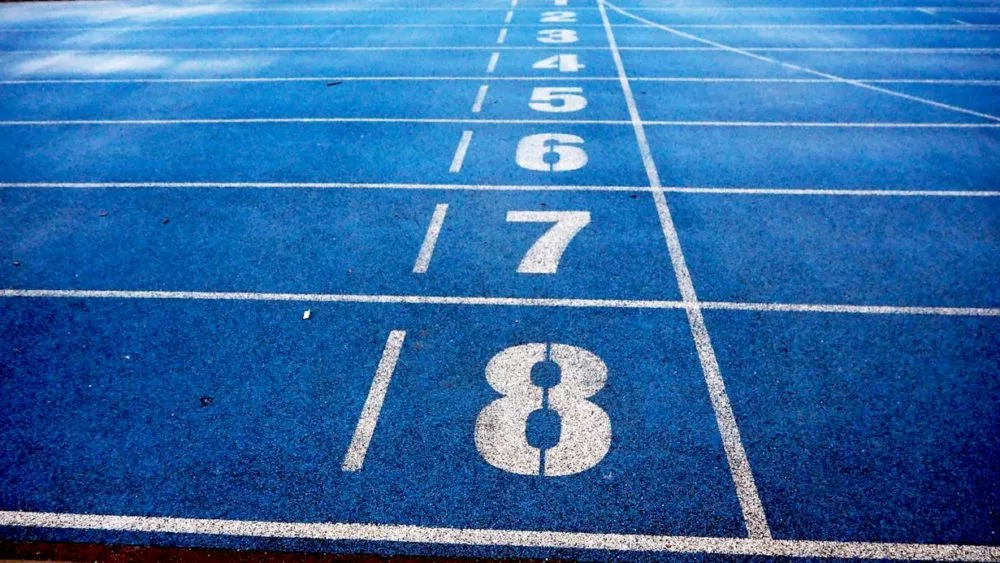 Photo shows running lanes on track.