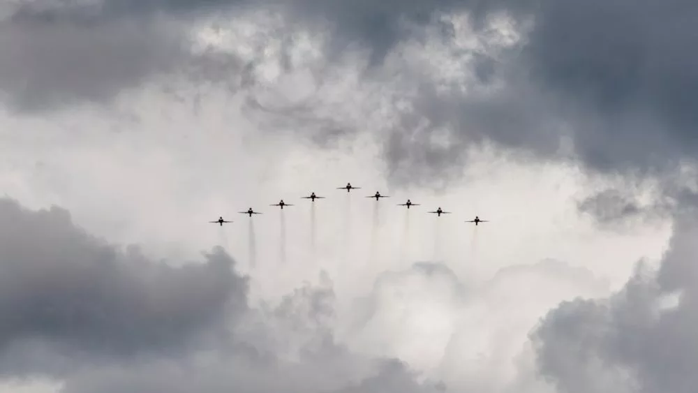 Photo shows jets flying in formation.