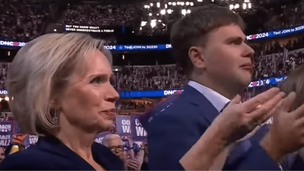 Minnesota First Lady Gwen Walz and her son^ Gus Walz^ at the DNC Wednesday night