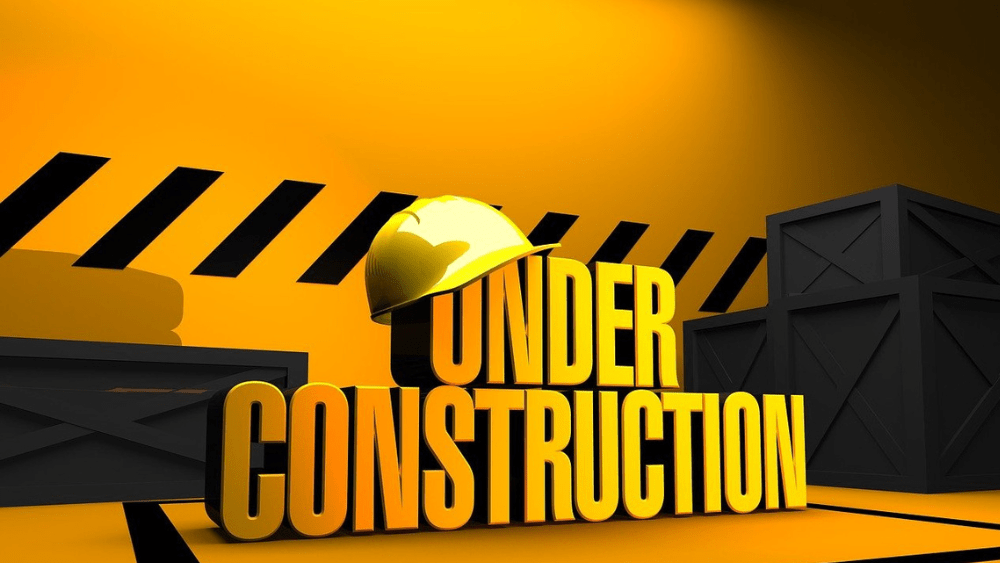 Yellow under construction sign