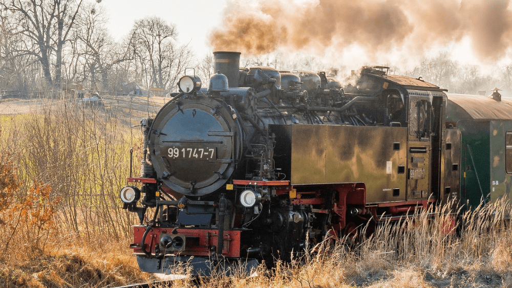 a steam engine in a field